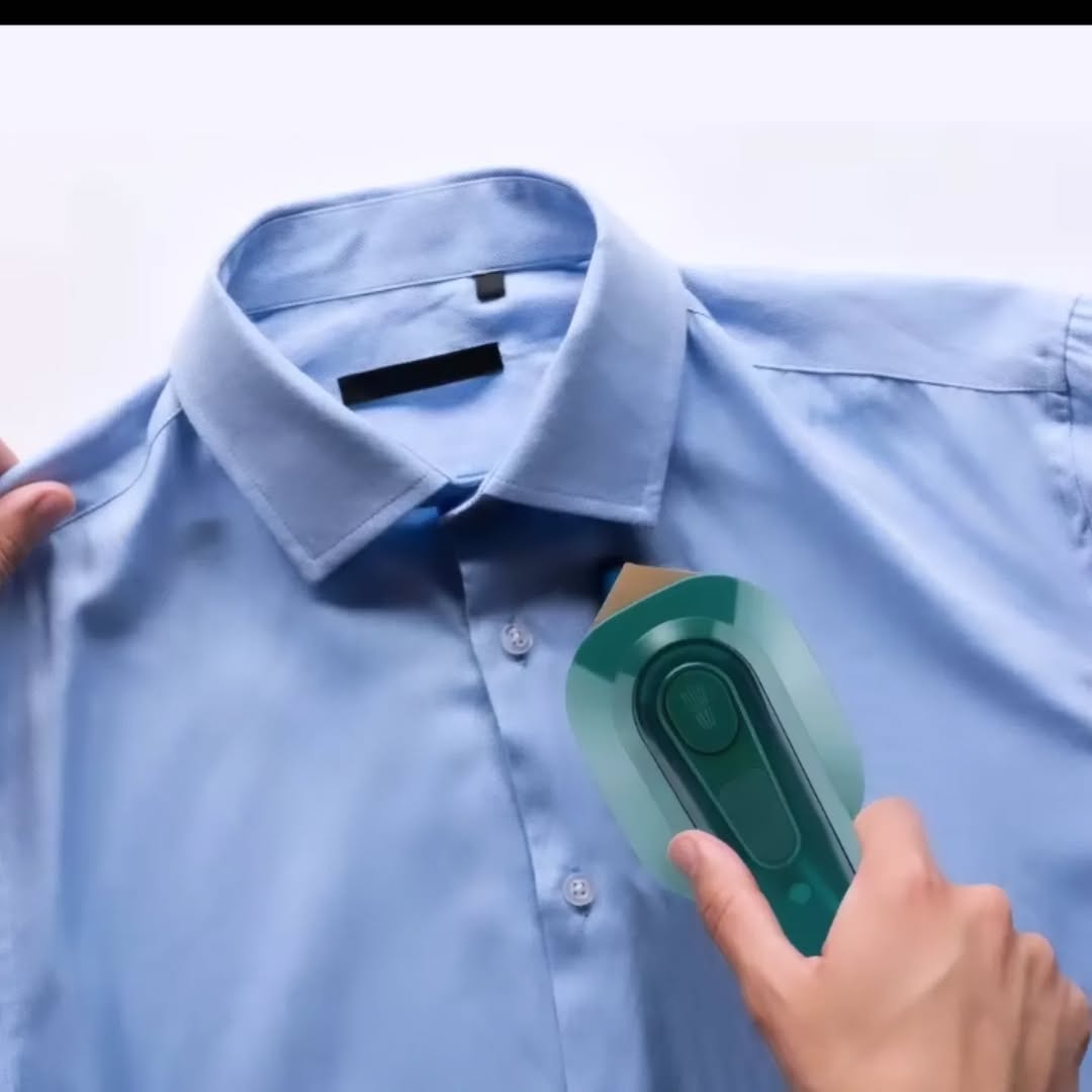 Electric handheld steam iron