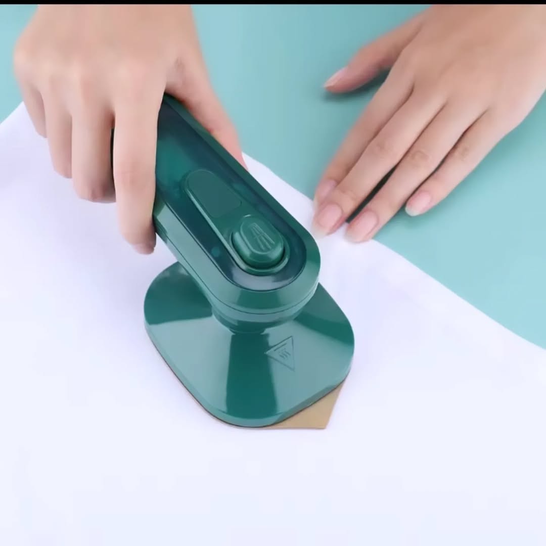 Electric handheld steam iron