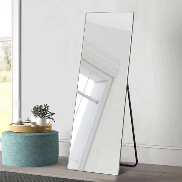 Stand alone mirror with metallic frame