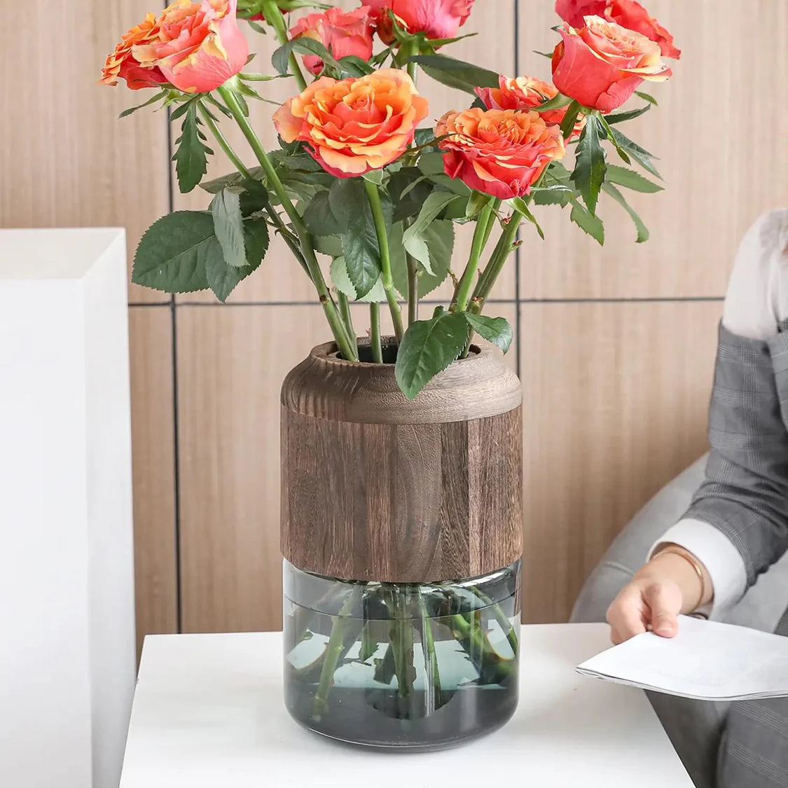 Modern creative glass vase with removable wooden decorative touch.